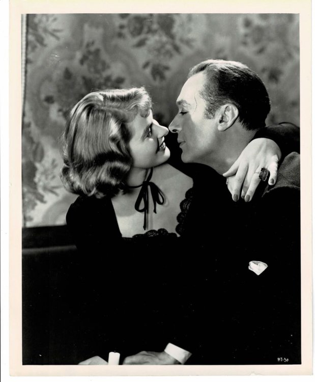 Image for A VINTAGE PUBLICITY PHOTOGRAPH of Hollywood Movie Stars INGRID BERGMAN and CHARLES BOYER in a scene from A VINTAGE PUBLICITY PHOTOGRAPH of Hollywood Movie Stars INGRID BERGMAN and CHARLES BOYER in a scene from